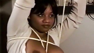 Eager black bitch gets tied up to take some nasty punishment