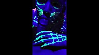 Teasing blacklight blowjob