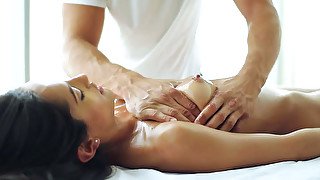 Alluring long haired black head gets fingered right in the massage parlor