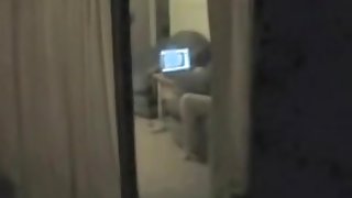 Window spy cam shoots girl masturbating before comp