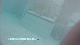 This Young Couple Plays Together Underwater In Front Of Many People