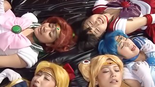 Japanese cosplay babes get on their knees and suck dick