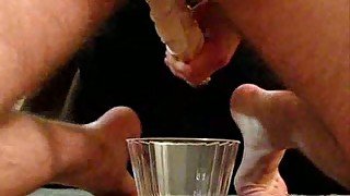 Milking my dick into cup and fucking my ass with dildo