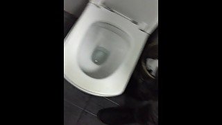 In a public toilet in public, Gloryhole sucks my uncircumcised cock