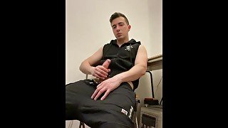 Muscle twink jerks off and cums in gym clothes