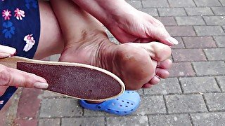 Outdoor foot care on the left foot