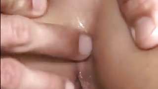 Hot blonde has her first anal orgasm.