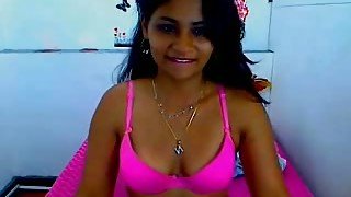 Desirable Latina babe shows me her goodies while webcamming