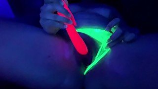 Fucking myself under a black light with a few of my toys