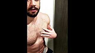 Hairy muscle jock gets horny and strips in the gym showers