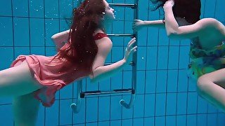 Naked Russian girls swim underwater