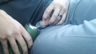 Desperate parking lot piss into thermos