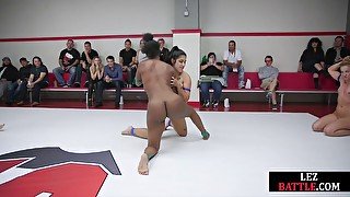 Wrestling lez winners facesitting losers in public orgy