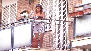 spying neighbour milf with great legs on balcony