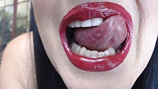 Big Red shiny Over drawn lipstick application