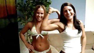 girls flexing lift and carry and arm wrestling