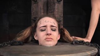 Submissive slut tormented in the barrel