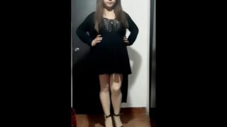 Cute crossdresser wearing dress and heels 