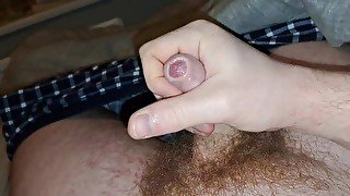 Jerking a pretty cock and making it cum a big stream (small uncut penis)