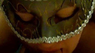 Busty girl in facial mask sucking my dick deepthroat