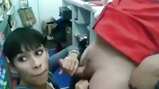 Beautiful girl blows him behind the counter at work