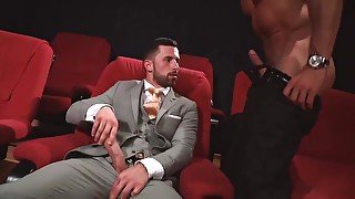 Two handsome gays fuck in the cinema