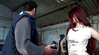 Two young sluts get fucked by workers in a garage