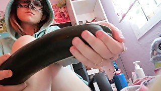 Masked and eager to footjob cucumber!