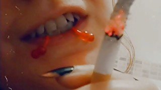 Smoking girl close up