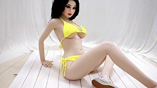 Fetish video of a good looking sex doll with shaved pussy