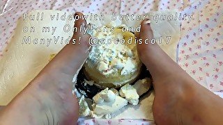 Smooshing a vanilla cake with my cute little feet