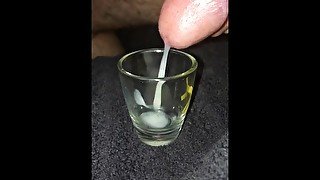 A little miss at the beginning, slow motion cum shot glass