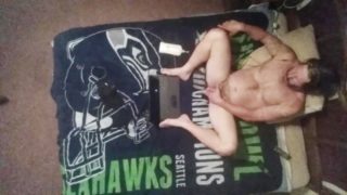 Seahawk fan masturbating on my bed with ceiling cam.