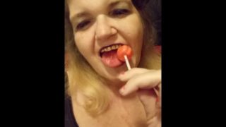 MILF drools over lollipop wishing it was your cock she was sucking!