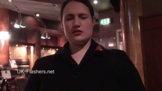 Amateur chubby and busty brunette masturbates in a restaurant