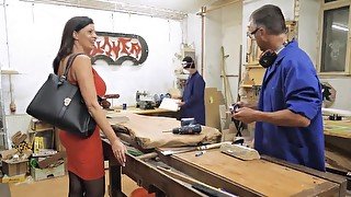 Hot MILF gets fucked by two carpenters at the workshop