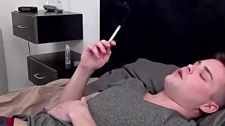 Young twink blasts out his big spunk load while smoking