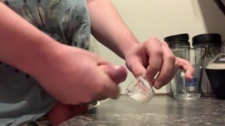 Cumming in a small measuring glass