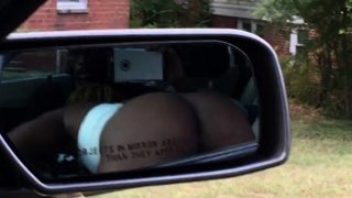 Black slut sucking dick in front seat of car