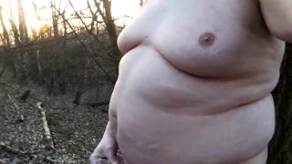 Chubby masturbates in the woods