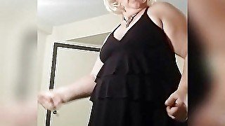 Skanky blonde stripteasing to polka music