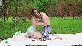 Outdoor romance after a sensual foreplay in the grass