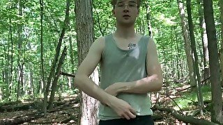 Blonde boy jerking off in the forest