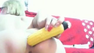 Webcam Milf sticks a corn shaped dildo in her gaping ass!