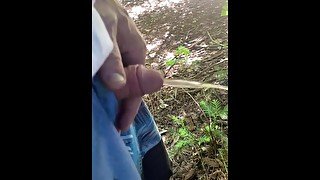 Pissing in the forest: an exhibitionist relieves himself after edging and cumming for you!