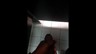 Stroking in bathroom at work