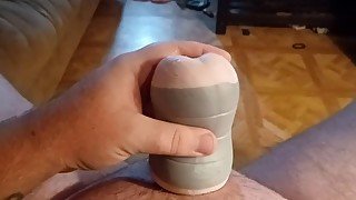 Chubby guy moaning fucks pussy toy