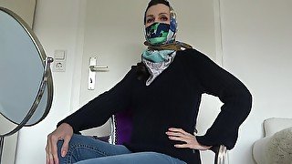 Silk cloth mask and headscarf with turtleneck sweater and jeans