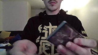 Nerd Opening a Pack of Trading Cards