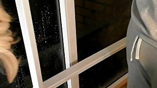 Hot blonde smokes on the balcony and sucks a dirty dick